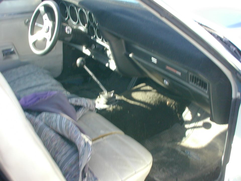 1972 Ford Ranchero interior showing dashboard, steering wheel, and bench seat