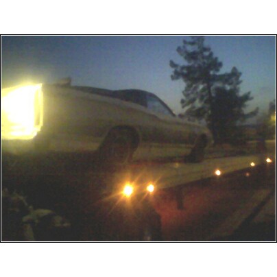 1972 Ford Ranchero - 1972 Ford Ranchero front view at dusk with headlights illuminated.