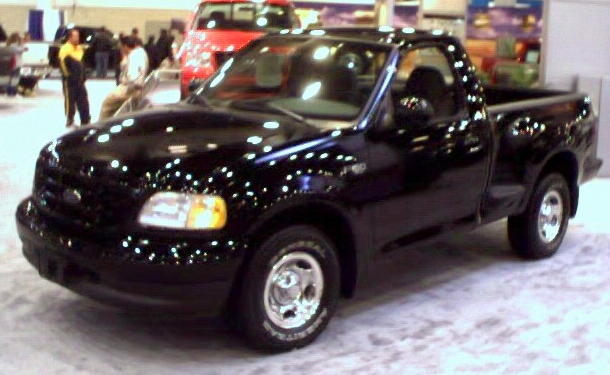 Black pickup truck, 3/4 front view