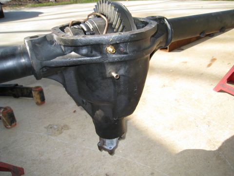 1996 Ford Bronco - Close-up of an open differential axle housing, showing internal gears and components.