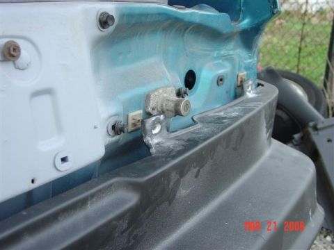 1993 Ford Probe - Close-up of a car part showing blue paint and a black bumper, with a timestamp indicating MAR 21 2008.