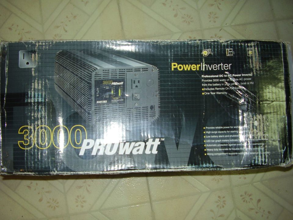 Boxed Xantrex Prowatt 3000 power inverter on a tile floor
