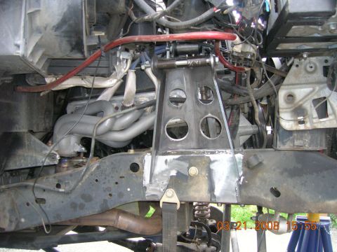 1996 Ford Bronco - Close-up view of vehicle engine bay components and frame structure.