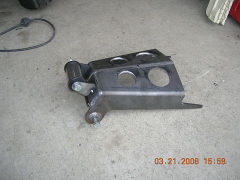 1996 Ford Bronco - A custom-made suspension component is shown on a concrete floor, with a date stamp of 03.21.2008.