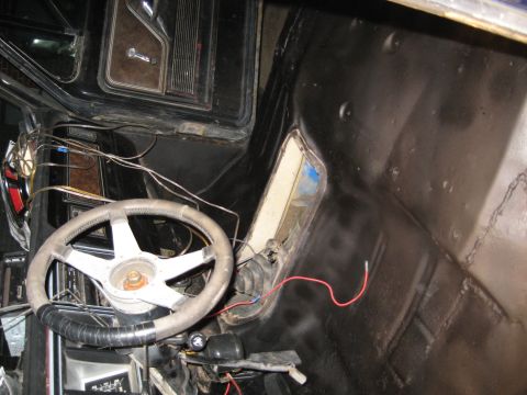 1978 Ford Bronco - Interior view of a vehicle, focusing on the dashboard, steering wheel, and wiring, with no visible year identification.