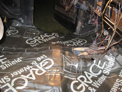1978 Ford Bronco - The interior floor of a vehicle is covered with Grace Ice & Water Shield insulation during a project.