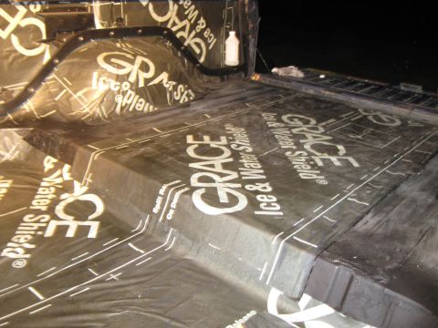 1978 Ford Bronco - The image shows the application of Grace Ice & Water Shield, a waterproofing membrane, with visible branding and installation lines.