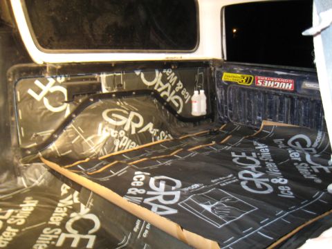 1978 Ford Bronco - Applying soundproofing material to the interior of a truck bed.