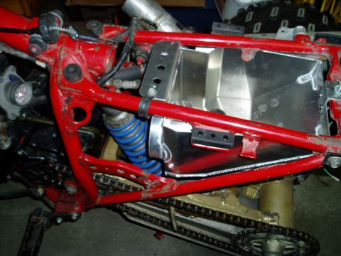 2000 Ford E350 - Close-up of a motorcycle's internal components, including the frame, suspension, and drivetrain.