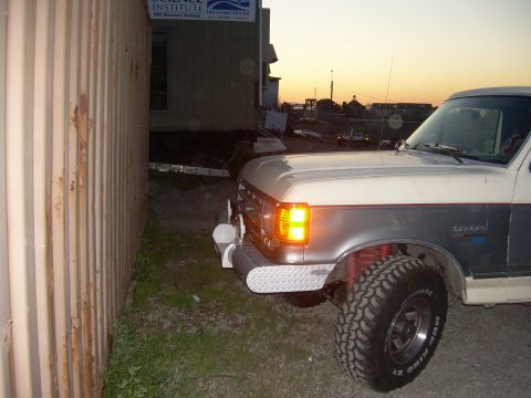 1991 Ford Bronco - This 1991 Ford Bronco is captured in a three-quarter front view, its distinctive two-tone paint scheme.