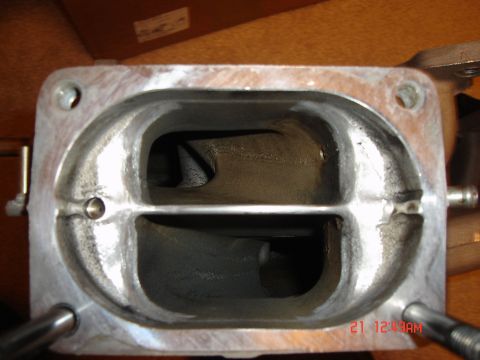 1993 Ford Probe - This is a close-up view of an intake manifold port, revealing its internal structure and runners.