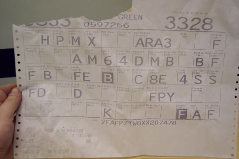 2001 Ford Crown Victoria - This document contains a VIN and various codes, possibly related to vehicle options or manufacturing.
