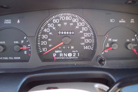 2001 Ford Crown Victoria - The dashboard displays the odometer reading of 98,850 miles, along with fuel, temperature, and oil gauges.