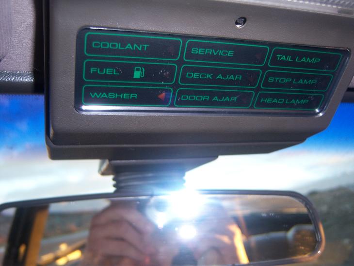 Overhead console indicator lights: coolant, service, tail lamp, fuel, deck ajar, stop lamp, washer, door ajar, head lamp