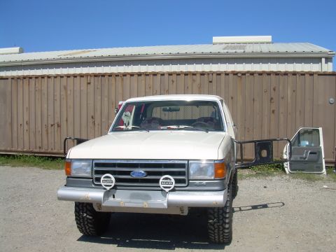 1991 Ford Bronco - This 1991 Ford Bronco is shown from the front with its driver's side door detached.