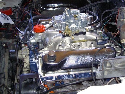 1972 Ford Ranchero - Close-up of a V8 engine, showing the carburetor, distributor, and valve covers.
