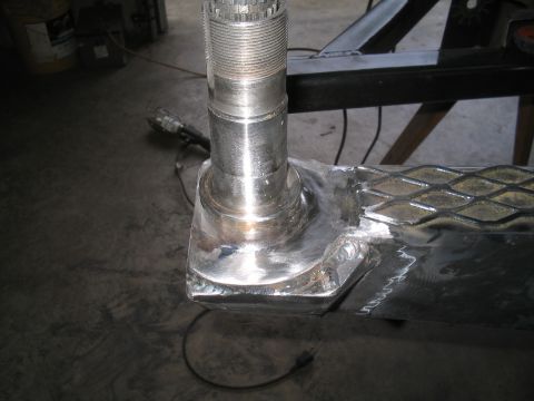 1989 Ford Bronco - Newly welded metal component with a threaded end and diamond plate detail.