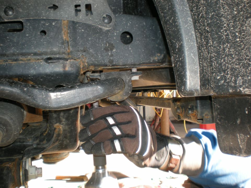 Front suspension part with FR marking and Supermotors.net logo