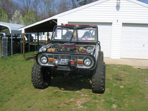 1992 Ford Mustang - This modified Ford Bronco features a lifted suspension, off-road tires, and a front-mounted winch.