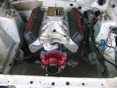 1992 Ford Mustang - Engine bay view of a Ford V8 with aftermarket performance parts installed.