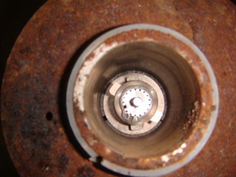 1996 Ford Bronco - This is a close-up view of a rusty winch hub assembly, showing the internal splined mechanism.