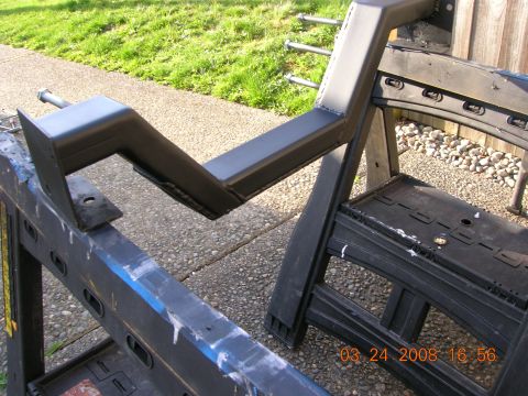 1996 Ford Bronco - Metal frame part undergoing work, supported by sawhorses. Date stamp visible on sawhorses.