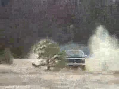 1982 Ford Bronco - Tearing ass before I submerged her.