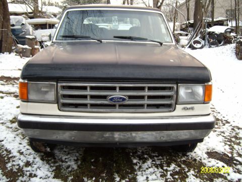 1988 Ford Bronco - The front grille and headlights suggest a 1987 model year Ford Bronco.
