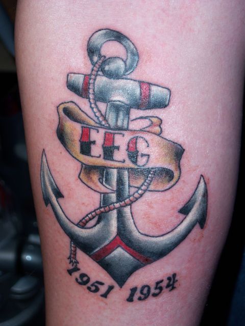 1996 Ford Bronco - This tattoo features an anchor with a banner and significant dates.