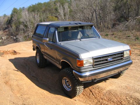 1989 Ford Bronco - This 1989 Ford Bronco is shown off-road on a dirt track.