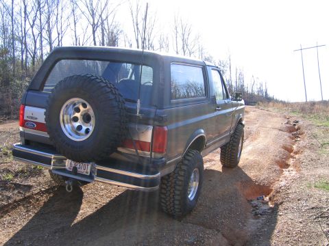 1989 Ford Bronco - This 1989 Ford Bronco is navigating a challenging off-road trail.