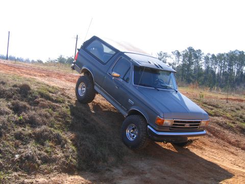 1989 Ford Bronco - This 1989 Ford Bronco tackles an off-road incline.