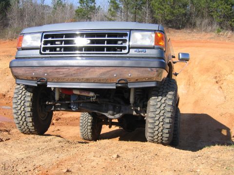 1989 Ford Bronco - This lifted Ford Bronco navigates a challenging off-road course.