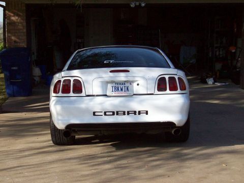 1997 Ford Mustang - Note the BLK section on rear bumer with BLK final inserts