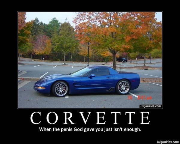 Blue Chevrolet Corvette parked in a lot during autumn