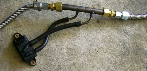 2000 Ford Crown Victoria - Exhaust pressure sensor assembly with metal and flexible tubing components.