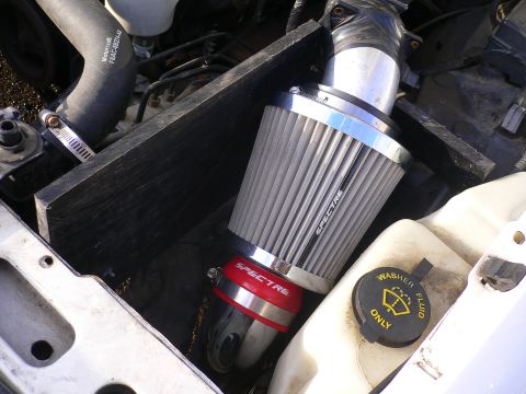 1999 Ford Crown Victoria - Aftermarket Spectre air intake system installed in the engine bay.