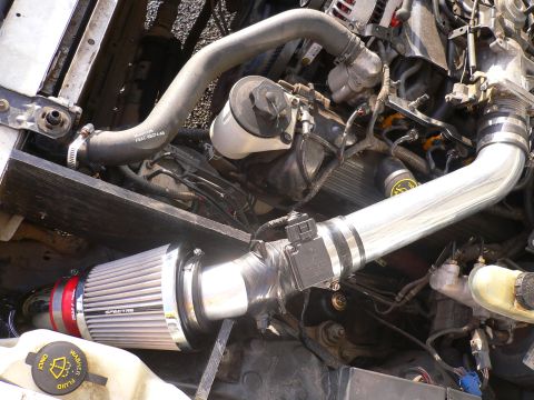 1999 Ford Crown Victoria - Mesh track Filter, custom Heat shield, Custom dual Forced cold air intake. Results in more power, lower engine and exhaust temps.....