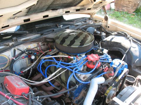 1985 Ford Crown Victoria LTD - Engine bay details with aftermarket parts, including a camouflage air cleaner and MSD ignition components.