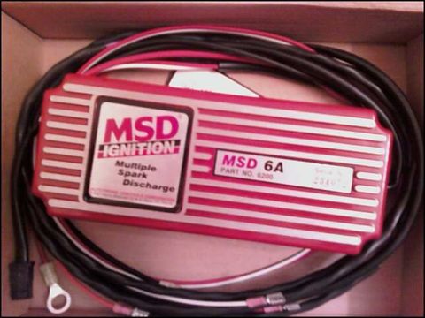1992 Ford Probe - A red MSD Ignition Multiple Spark Discharge box with part number 8200 is shown with its wiring harness.