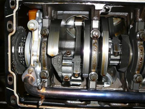 1997 Mercury Grand Marquis - Internal engine components, including the crankshaft and connecting rods, are visible in this close-up view.