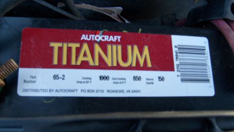 1995 Ford C-150 (Centurion Conversions) - A close-up view of an Autocraft Titanium battery, showing its specifications and part number.