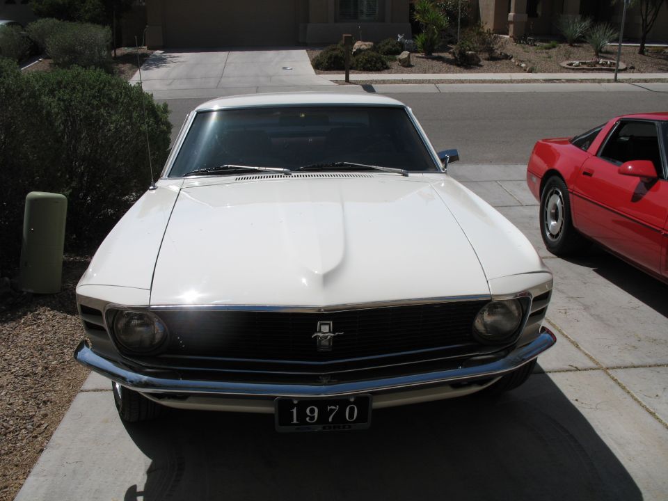 White 1970 Ford Mustang front view with 1970 license plate