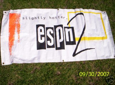 1993 Ford C-350 (Centurion Conversions) - Banner with ESPN 2 logo and text 'slightly hotter.' is displayed on grass.