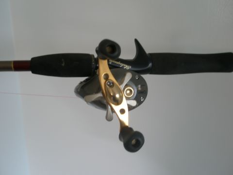 2007 Ford Bronco - A close-up view of a fishing rod and reel, with the brand name 'Shakespeare' visible on the reel.