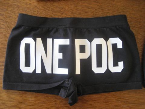 1993 Ford Probe - Black shorts with "ONE POC" printed in white text.