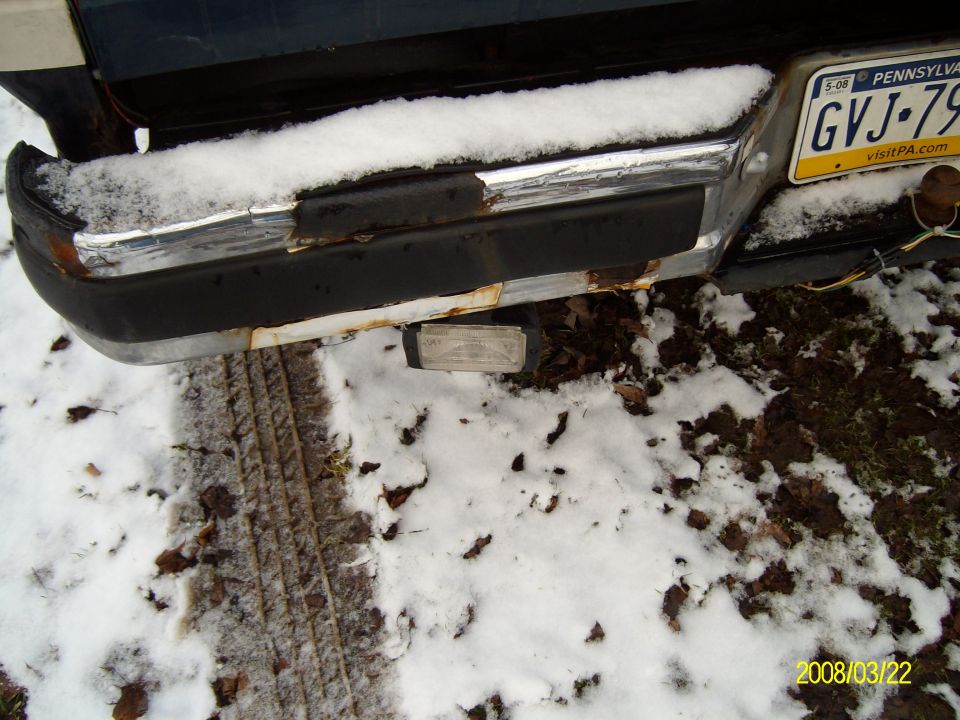 rear bumper, snow on it, Pennsylvania plate GVJ-79