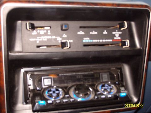 1988 Ford Bronco - Interior dashboard view showing the manual HVAC slider controls with labels (OFF, VENT, HEAT, A/C, PANEL, FLOOR, MIX, DEFROST) above an aft…