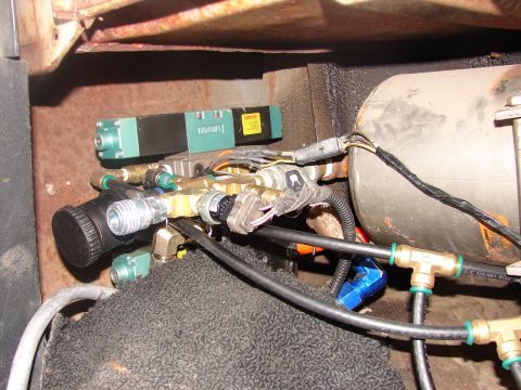 1973 Ford Ranchero - Close-up view of pneumatic and electrical components within a vehicle's air brake system.