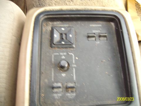 1986 Mercury Cougar - Interior view of a 1986 Mercury Cougar, showing the power window and lock control panel.